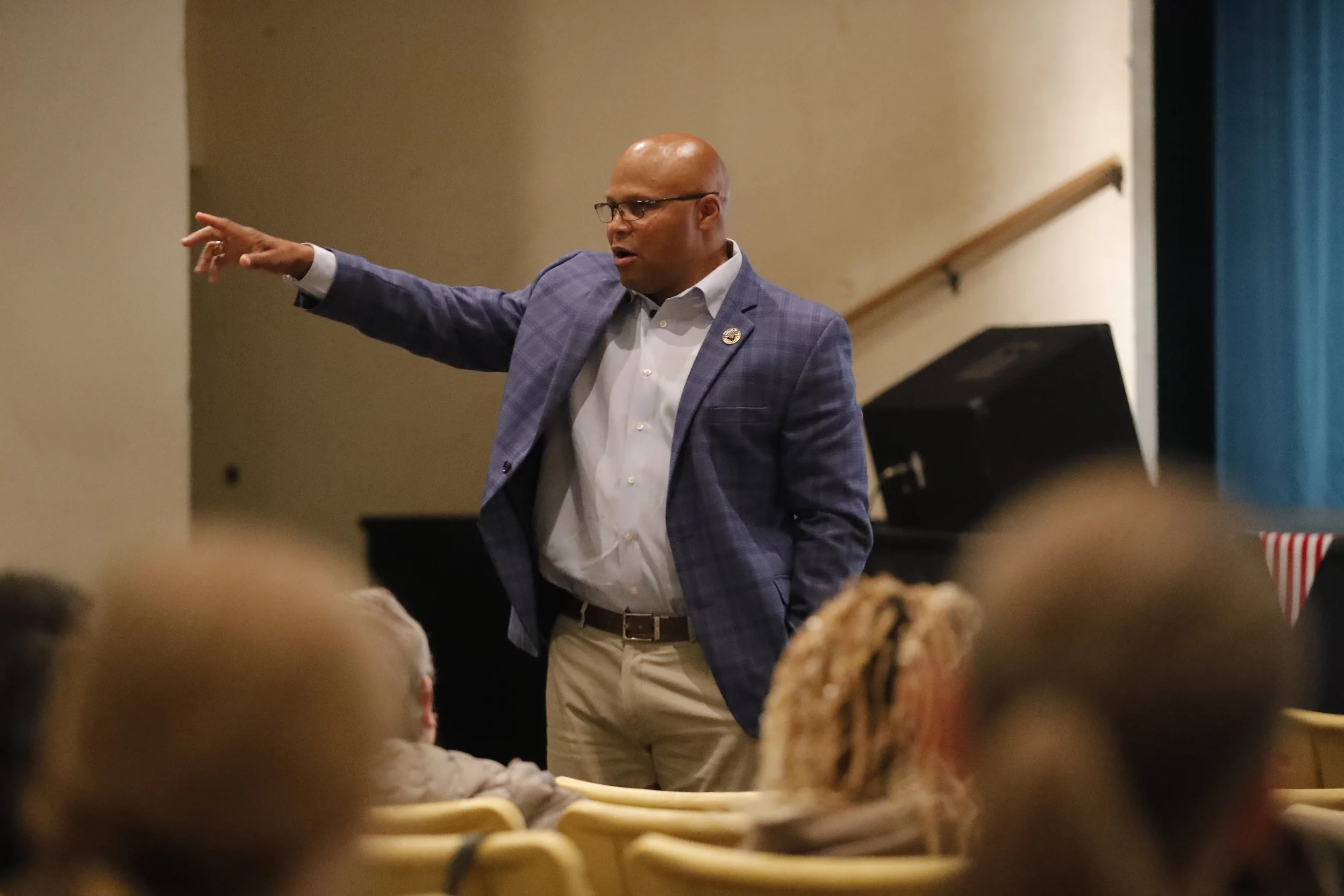Shawn Harris speaking at a town hall