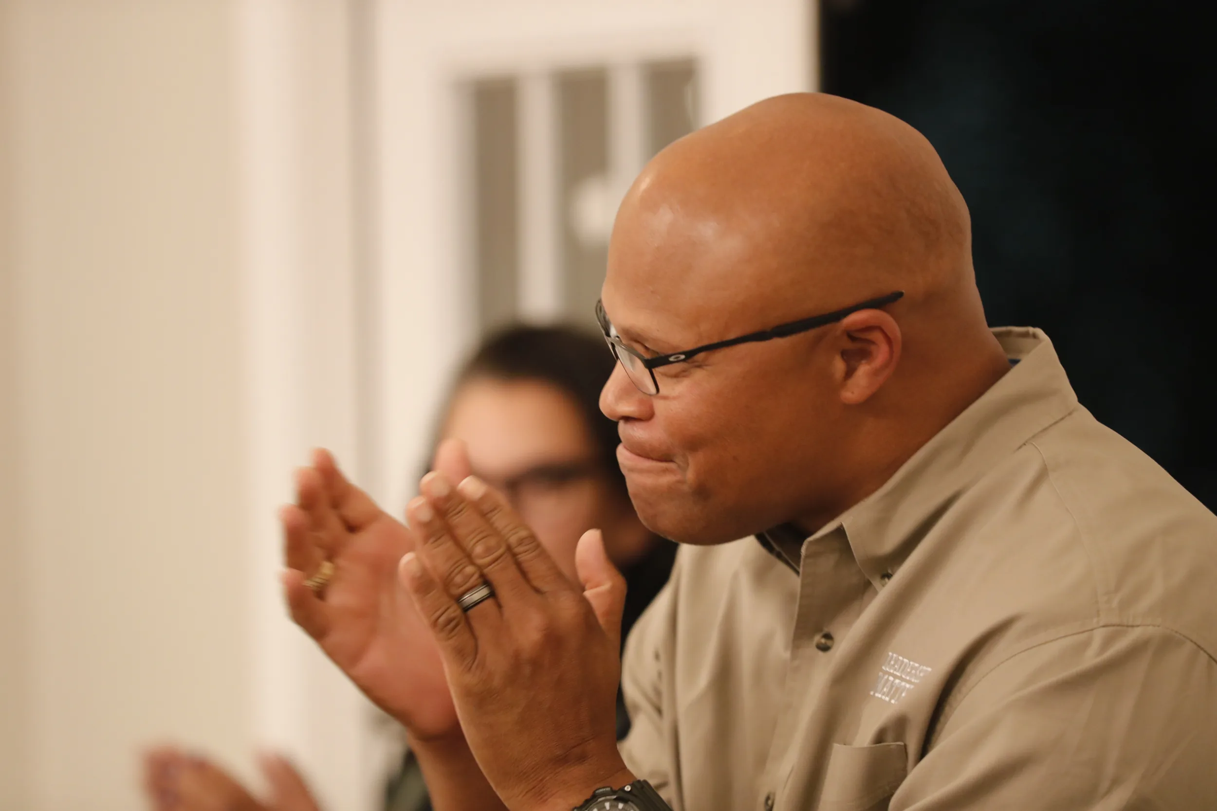 Shawn Harris listening at a campaign event