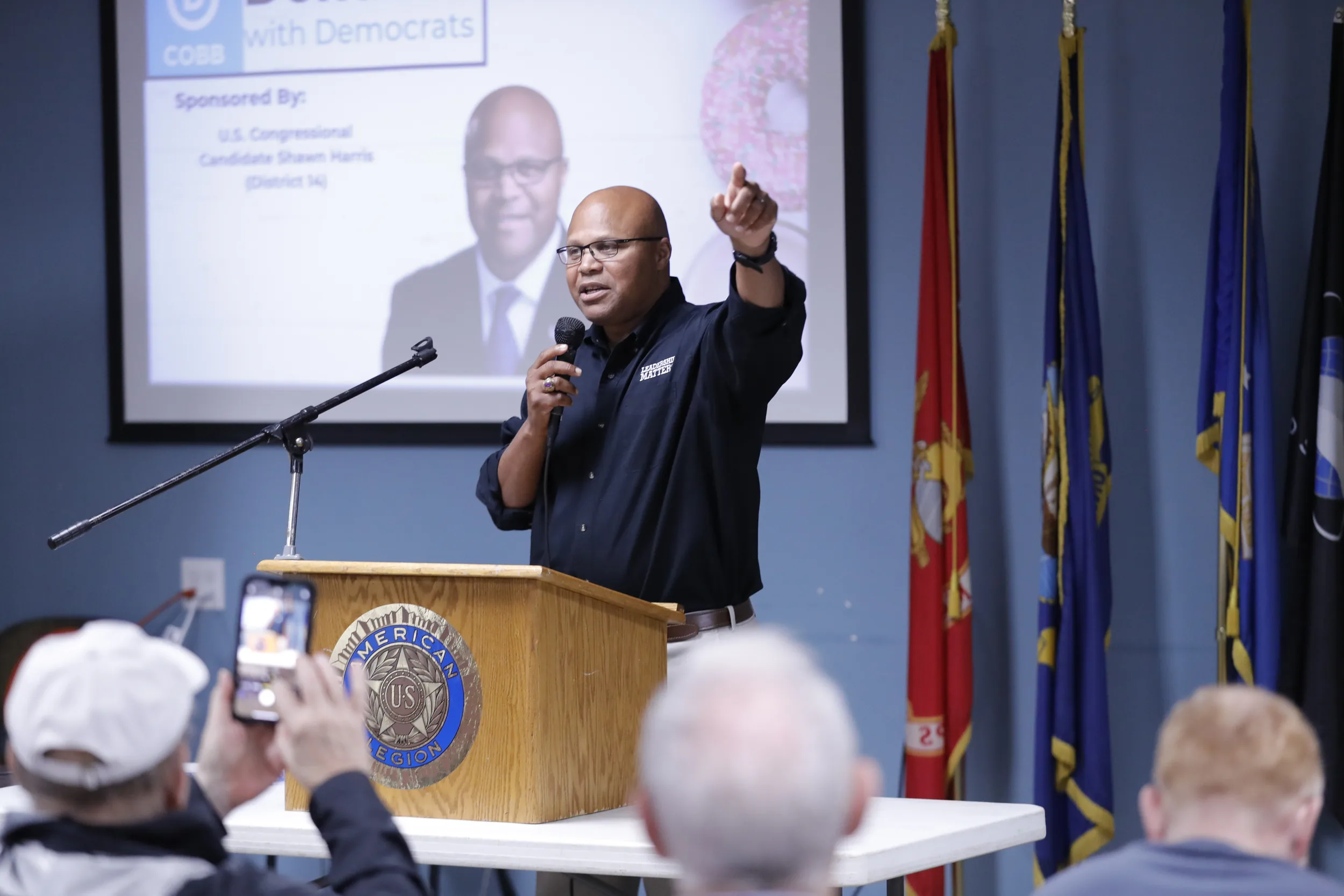 Shawn Harris speaking to veterans at an American Legion event