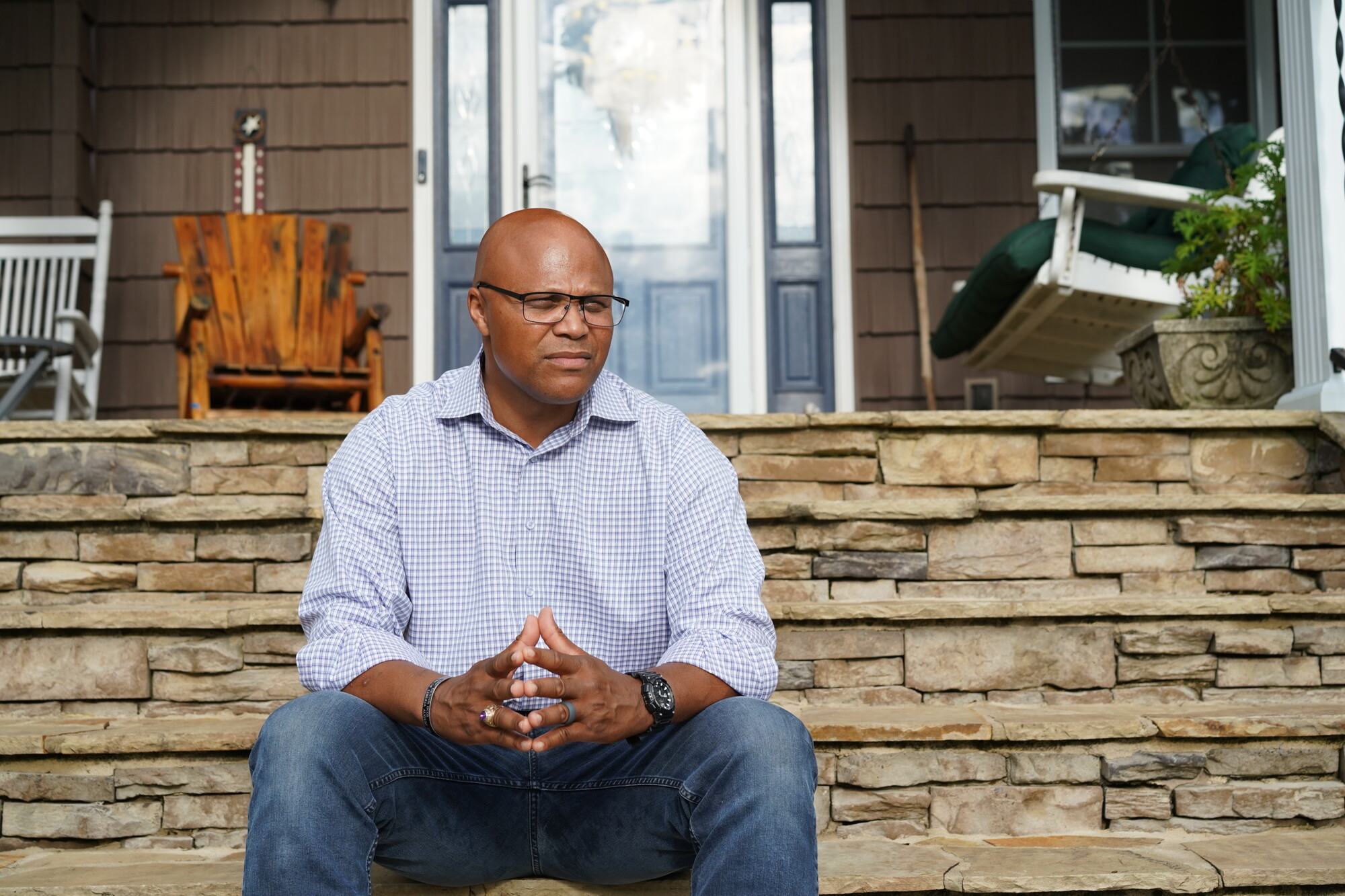 Shawn Harris seated on a porch in Georgia